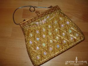 Petit sac doré, porté main