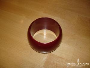 Gros bracelet en bois peint