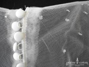 Hervé Mariage - Boléro dos boutonné en tulle brodé de perles avec manches longues
