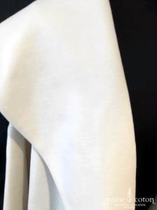 Delphine Manivet - Manteau mi long en laine ivoire, dos au point de croix