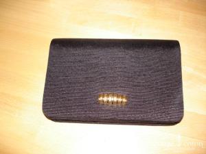 Pochette noire et dorée